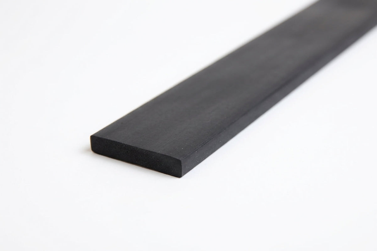 Black rectangular rubber strip shown at an angle, thin flat smooth profile