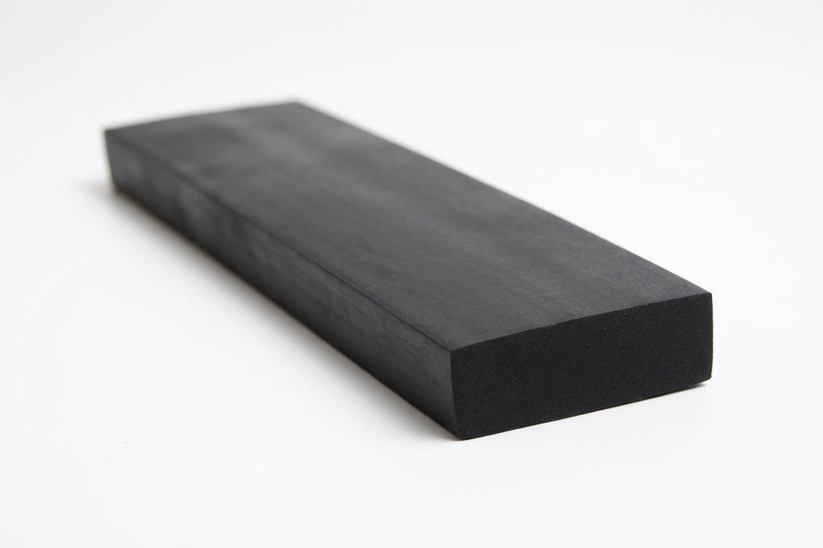 Black rectangular rubber strip shown at an angle, solid flat block profile
