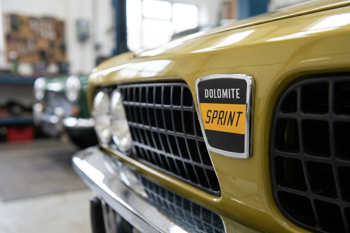 DOLOMITE SPRINT grille badge fitted to a yellow car's front grille