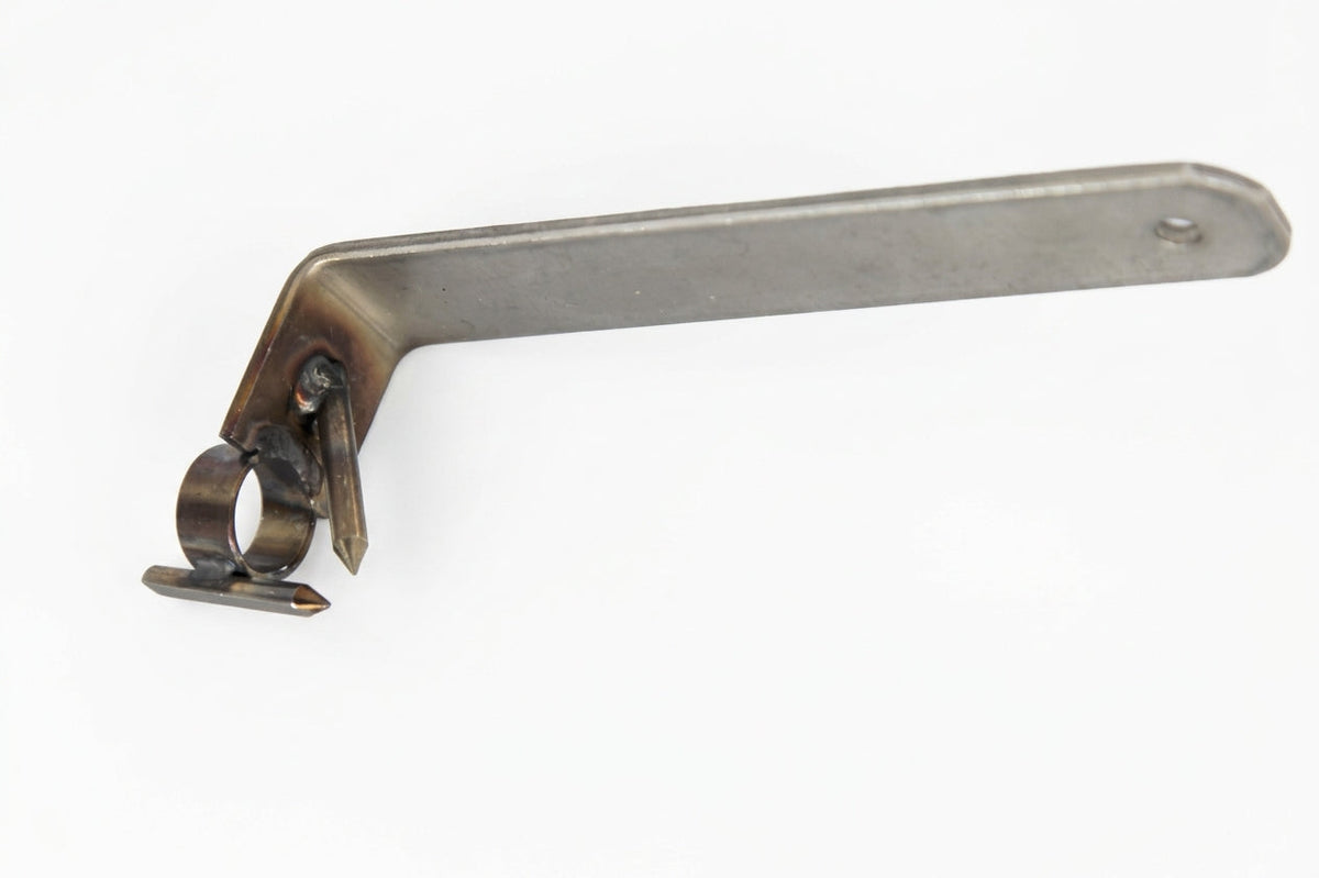 Flat metal fitting tool with a bent, notched end, shown on a white background
