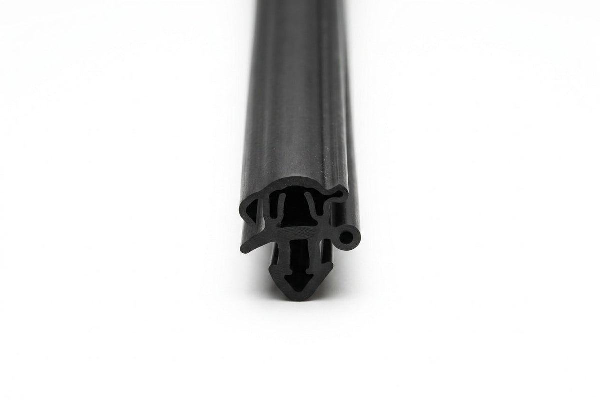 Black rubber windscreen seal with barbed locking channel, upright end-on studio shot
