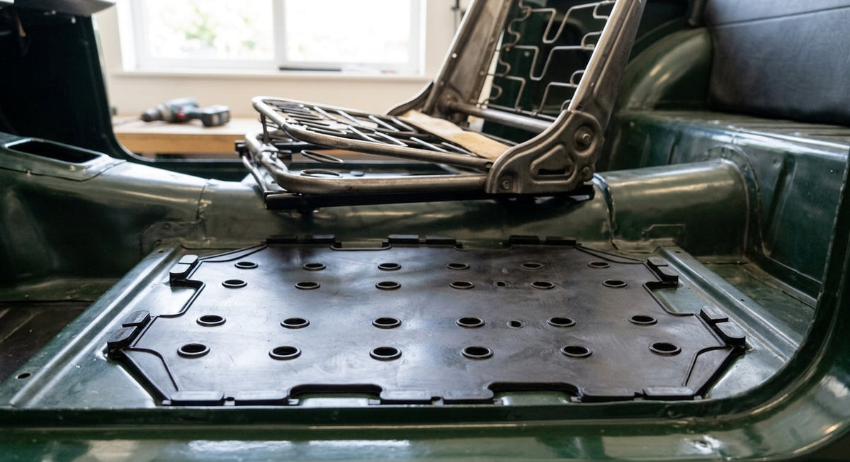 Seat diaphragm fitted into the seat frame of a green Triumph