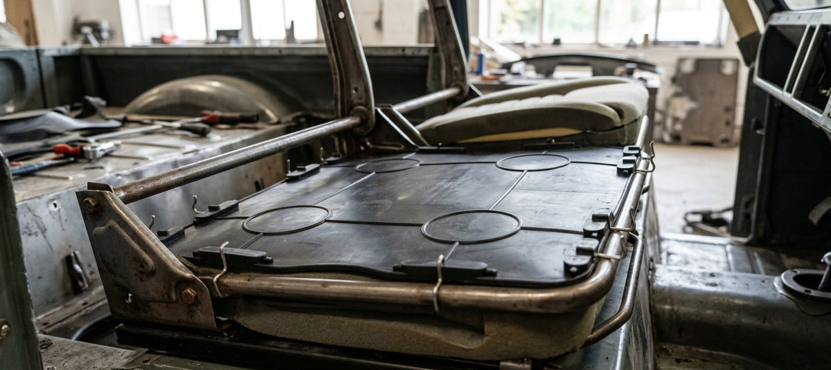 Diaphragm fitted to a seat frame inside a stripped-out Land Rover
