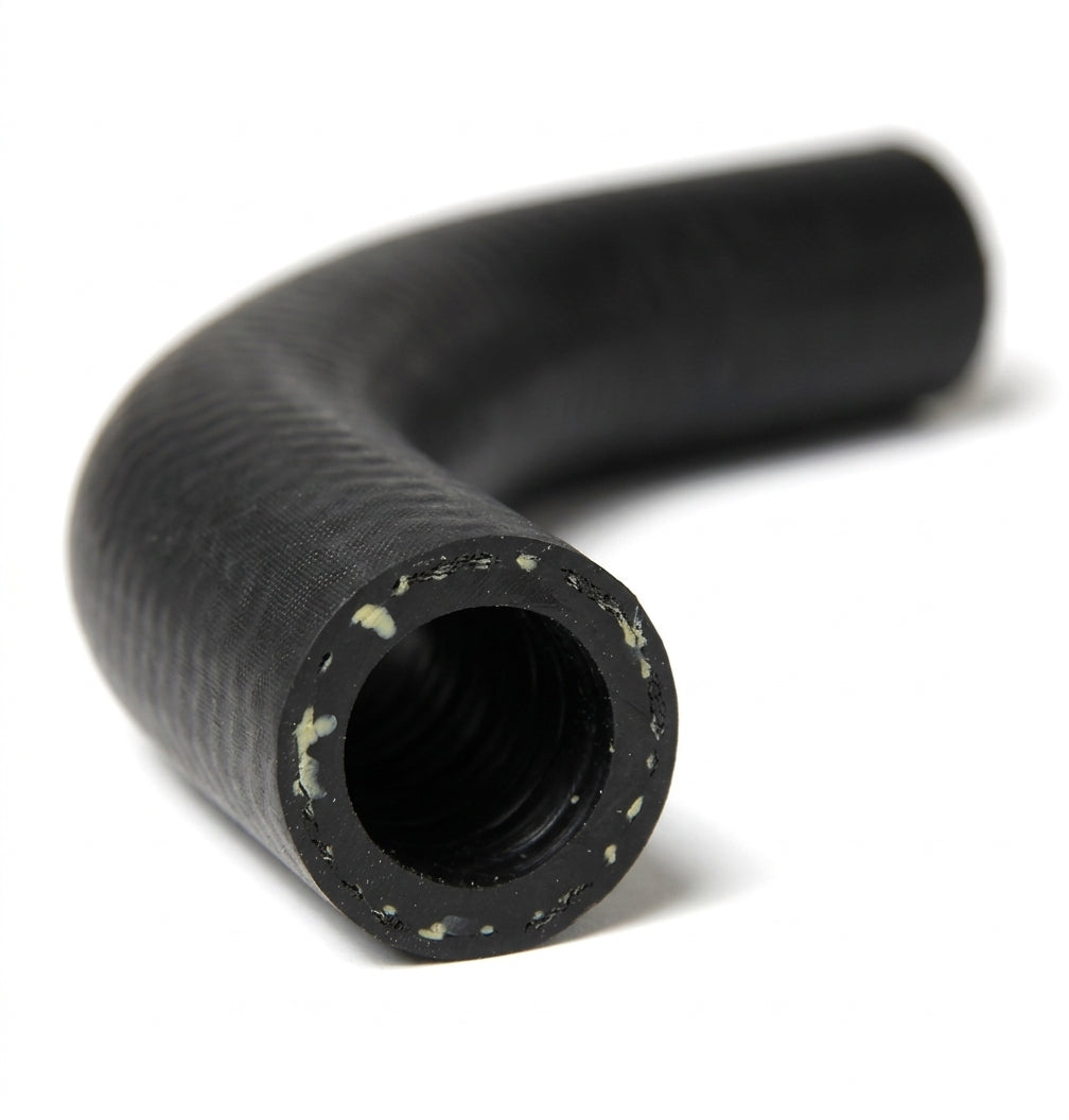 Black textured hose with 90-degree bend and reinforced cut end, studio shot