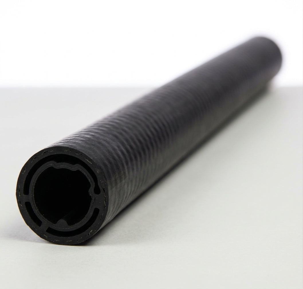Length of black ribbed heater hose with internal profile visible at cut end