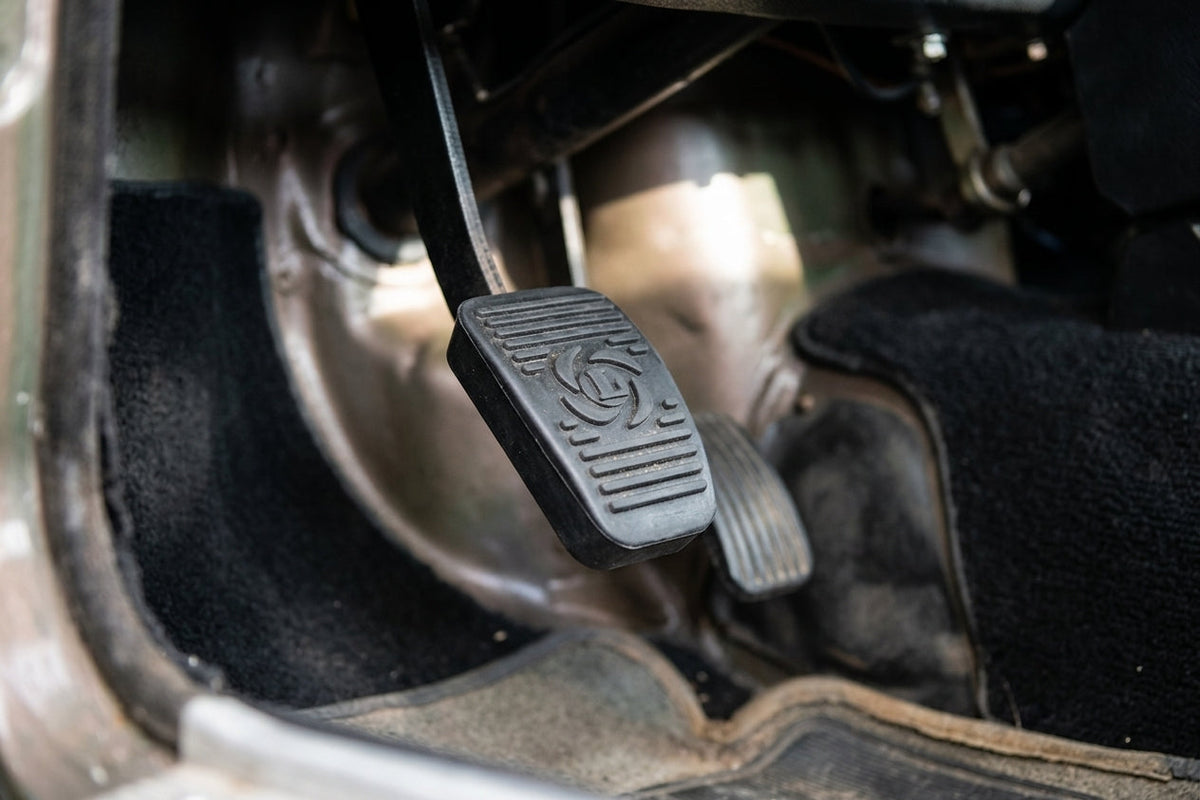 Accelerator pedal fitted in situ in a classic car's footwell