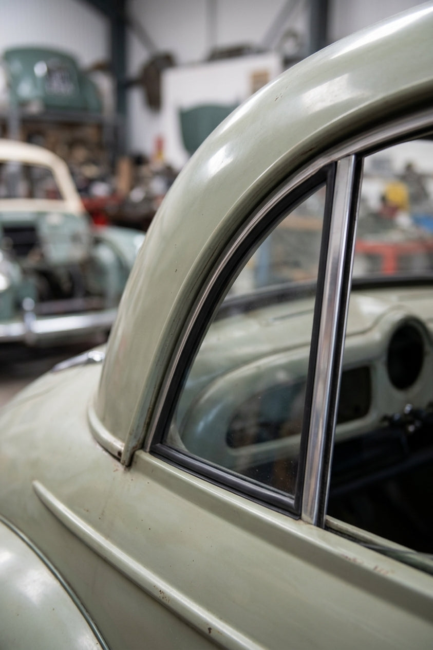 Chrome-edged rear quarterlight seal shown fitted to a pale green classic car