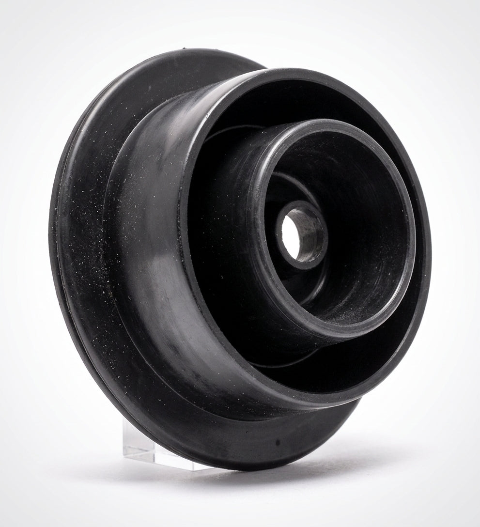 Black rubber gear lever gaiter with rounded cone shape, studio shot