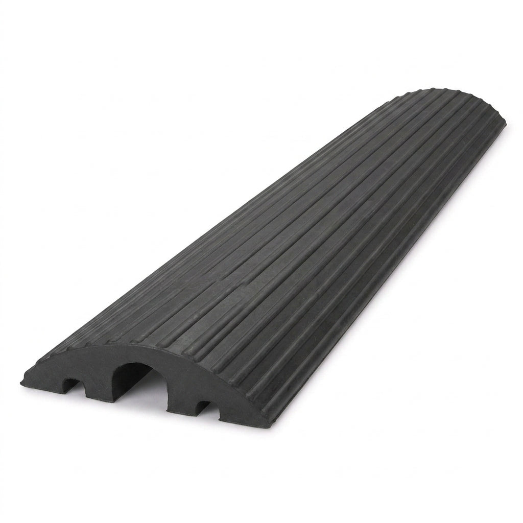 Black ribbed rubber cable protector with a large centre channel and two smaller outer channels visible at the open end, on a white background