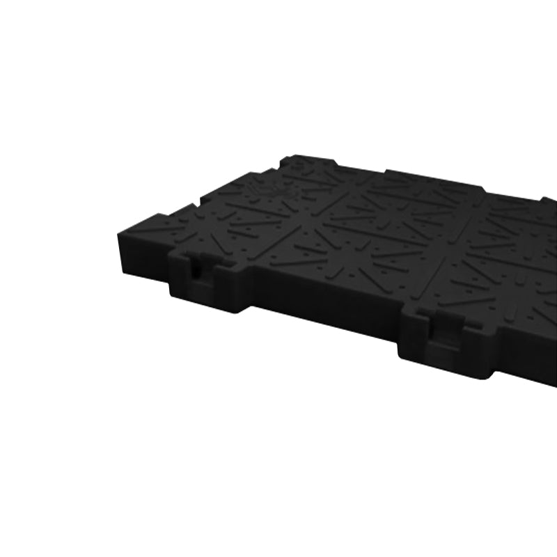Black interlocking ground protection tile with textured non-slip surface