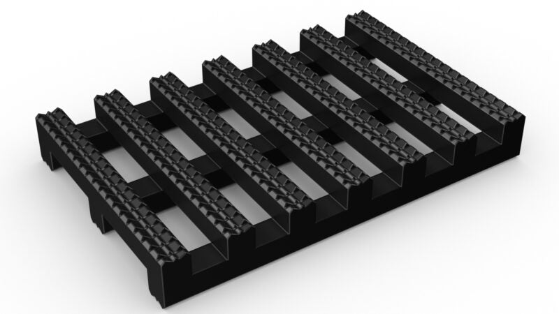 Black modular Roof Walkway Matting with high-profile, anti-slip ribs and open drainage channels, designed for safe maintenance access on a flat roof.