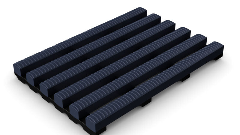 Navy blue modular High-Traffic Pool and Wet Areas Safety Mat section, featuring wide, raised ribs and open drainage channels for maximum non-slip protection.