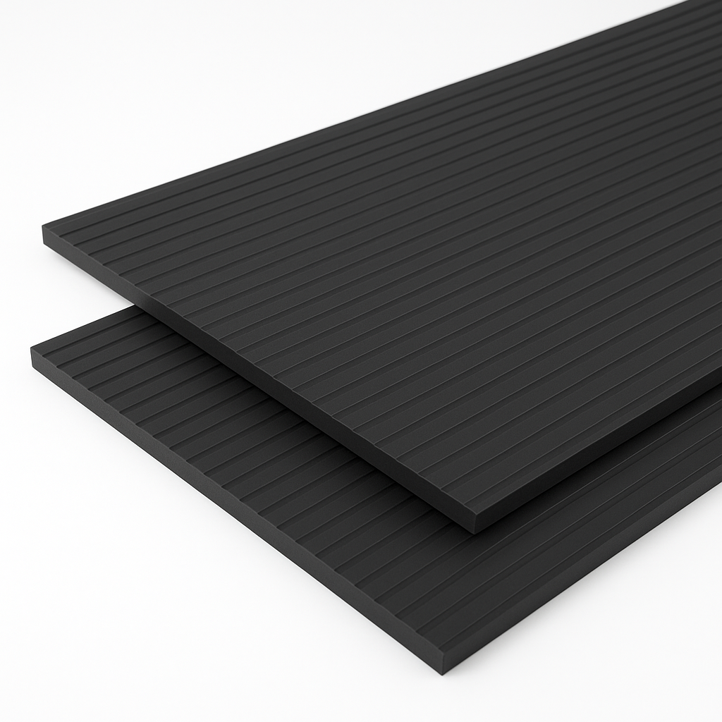 Two black rubber matting panels stacked offset on white, broad flat-topped ribs running lengthways