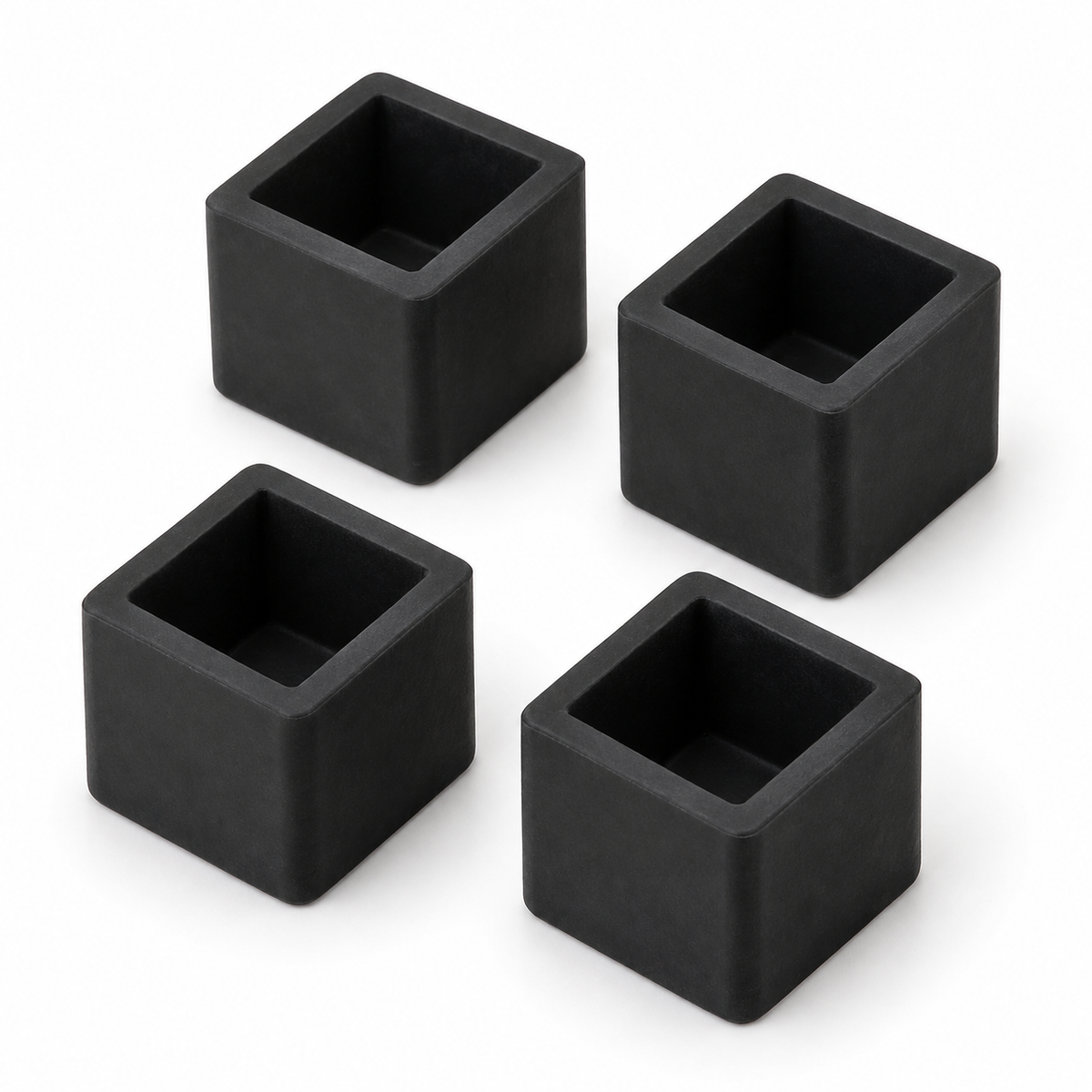 Four black square rubber feet with 12.7mm internal dimensions and 15mm internal length