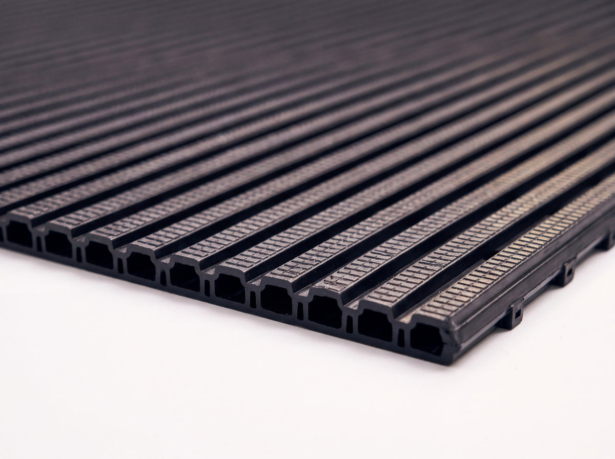 Close-up of the cut edge showing the 10mm profile and the hollow tubular chambers inside each rib