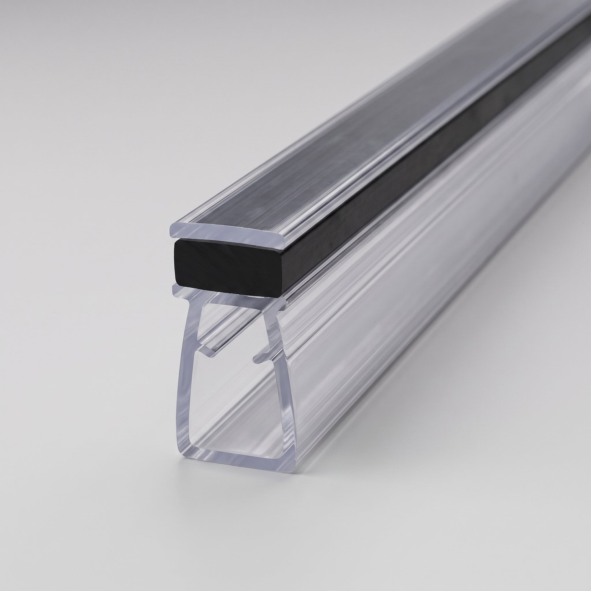 MAG034 clear magnetic seal profile - 6mm channel with gripping nibs for 4-6mm glass, magnet housing along the top, 16mm x 18mm