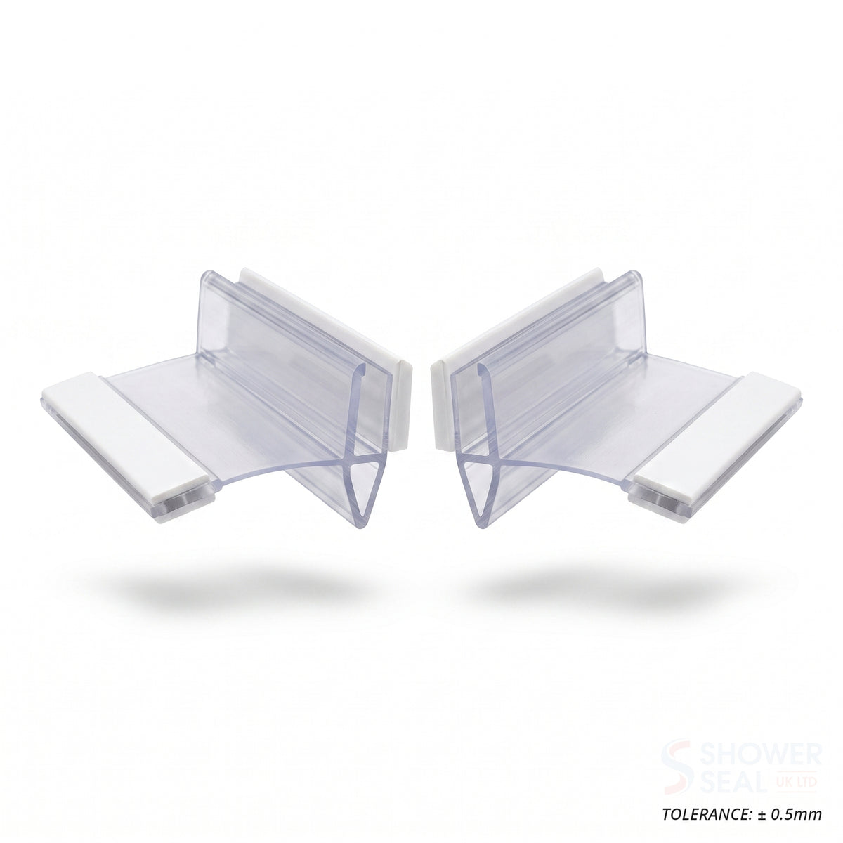 Two clear magnetic seal profiles side by side on white, white magnet housings on their flexible webs