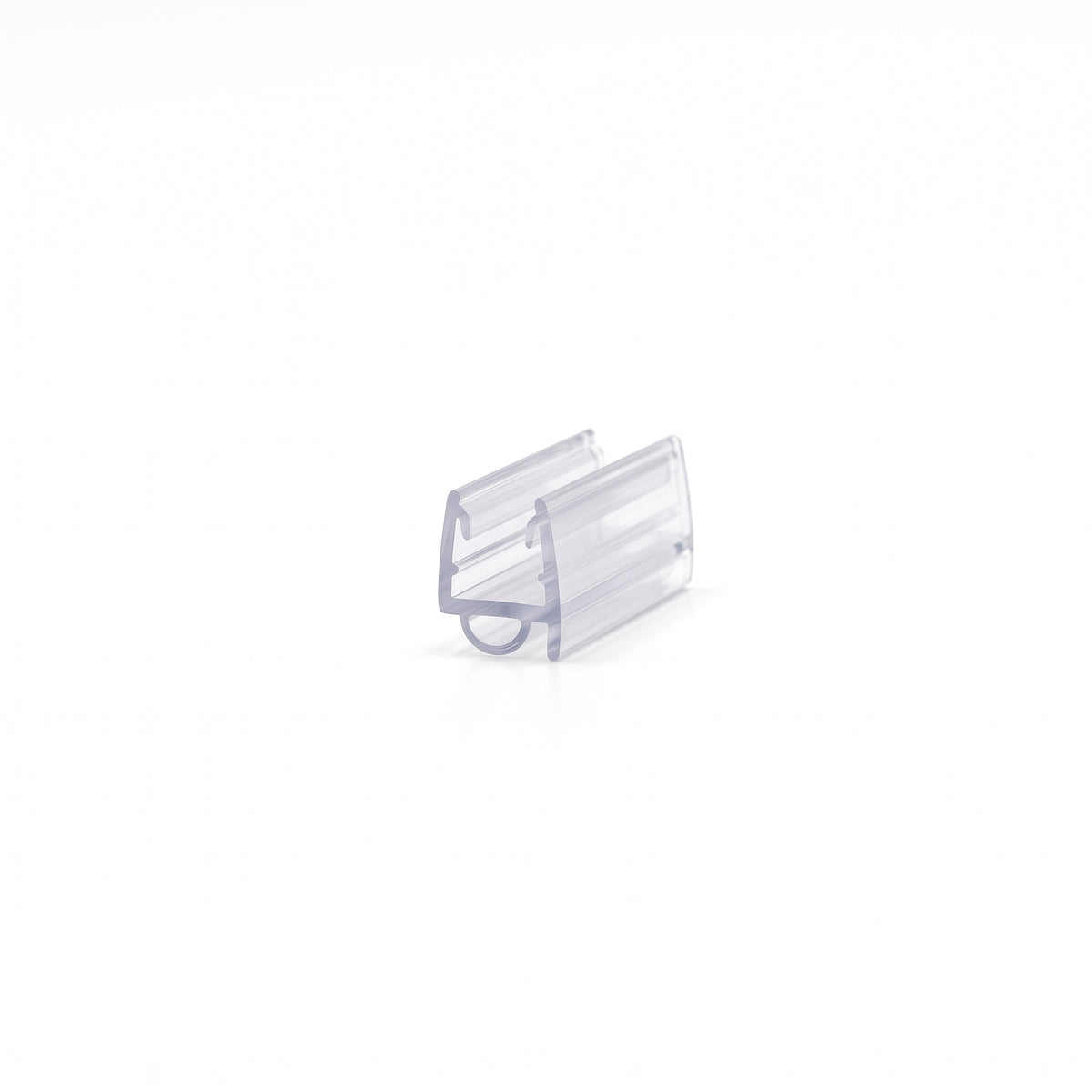 Small clear seal offcut on white, glass channel with a tiny hollow bubble under one side