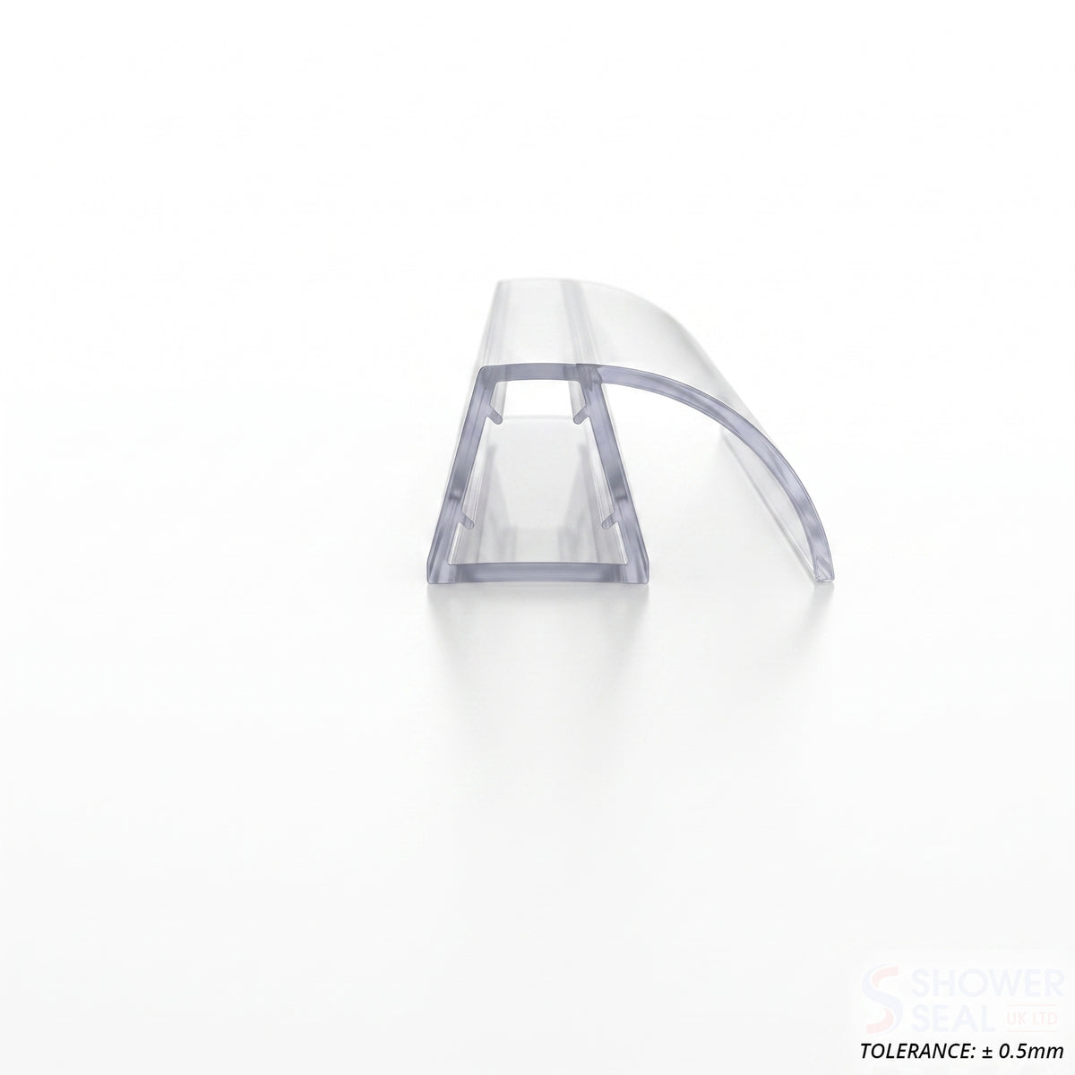 Clear arched-fin seal offcut on white, tapered glass channel with a curved fin sweeping off one side