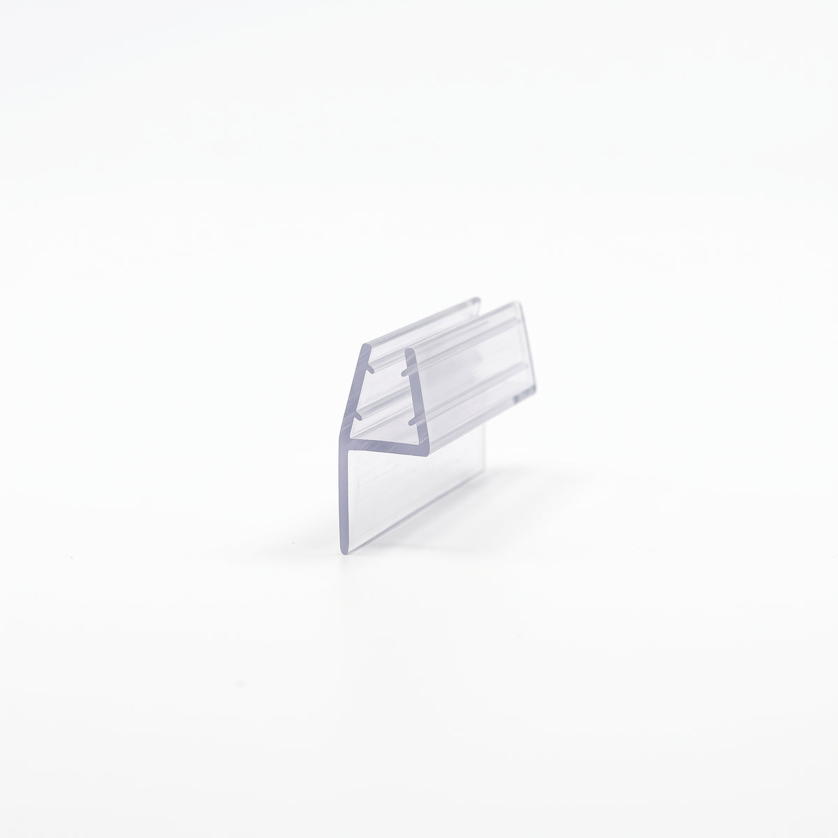 Clear seal offcut on white, trapezoid glass channel with a single flat blade off one side