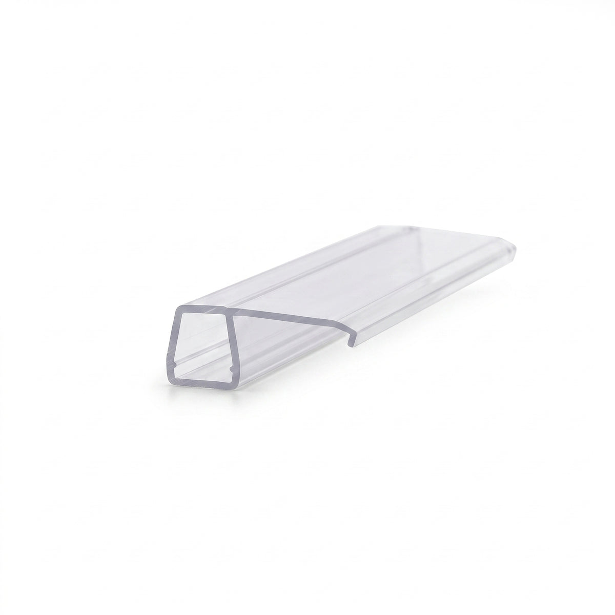 Clear seal offcut on white, glass channel with a broad flat rigid fin running off one side