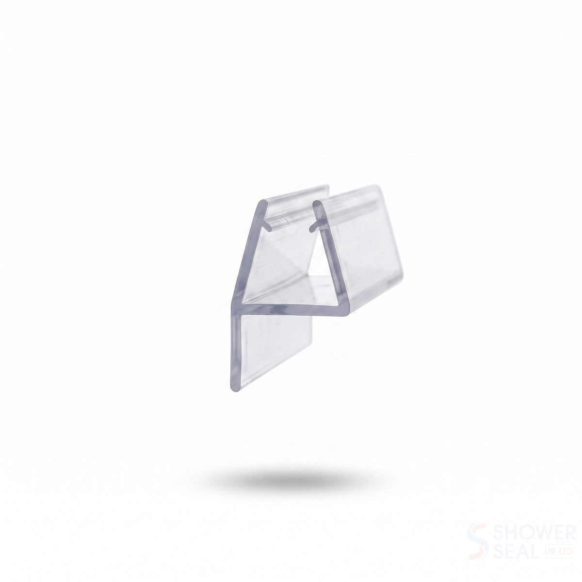 Clear seal offcut angled on white, glass channel with a flat blade folding away, Shower Seal watermark