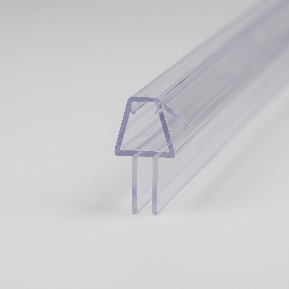 Length of clear seal on white, glass channel with an angled top fin and twin drip blades below