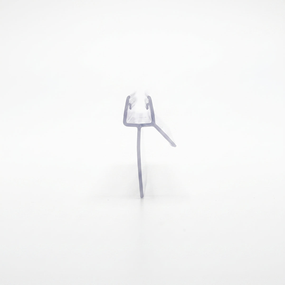 Clear seal offcut on white, end-on - small glass channel with an extra-long drop fin and short angled fin
