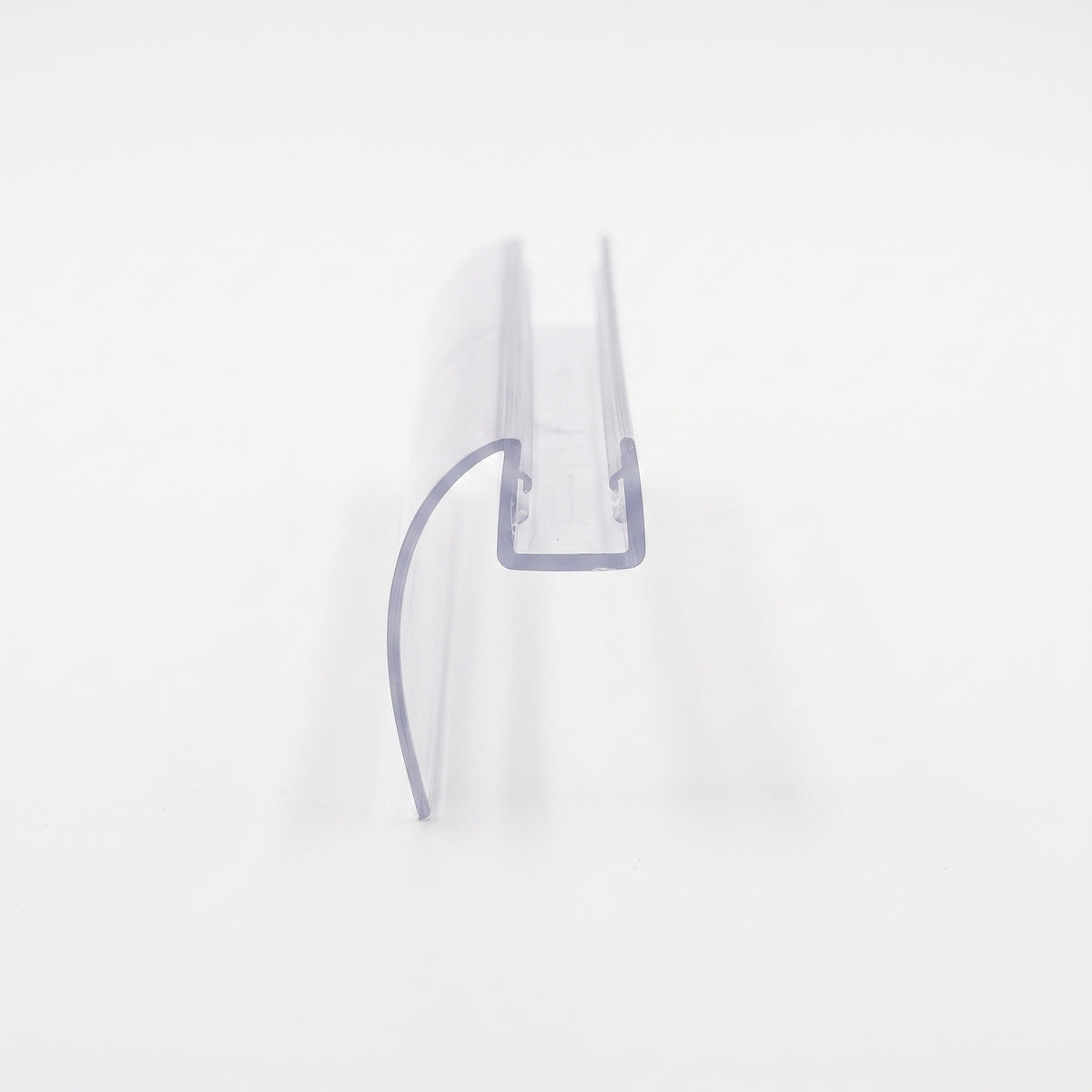 Clear seal offcut on white, glass channel with a curved blade sweeping down from one side