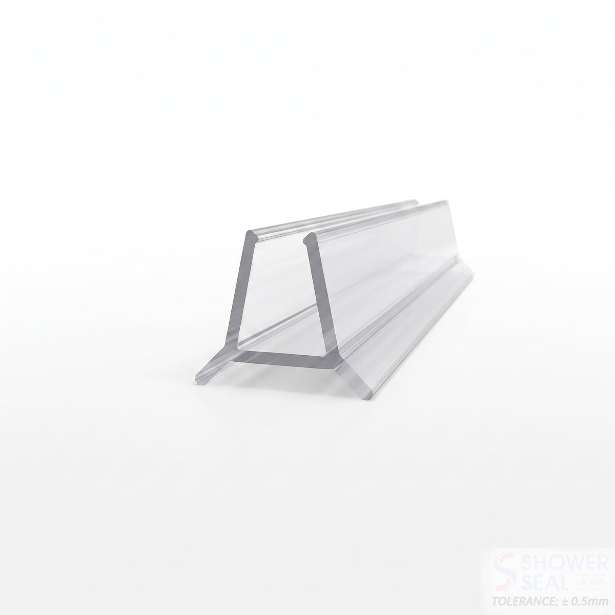 Clear seal offcut on white, glass channel on two splayed legs, watermarked lower right