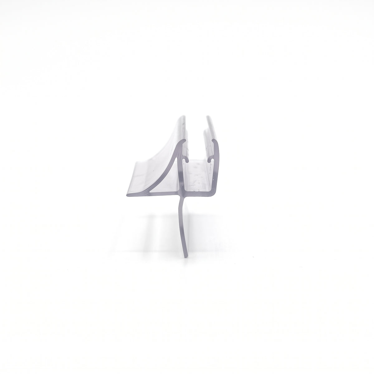 Clear seal offcut end-on on white, curved deflector fin one side and a long straight fin below