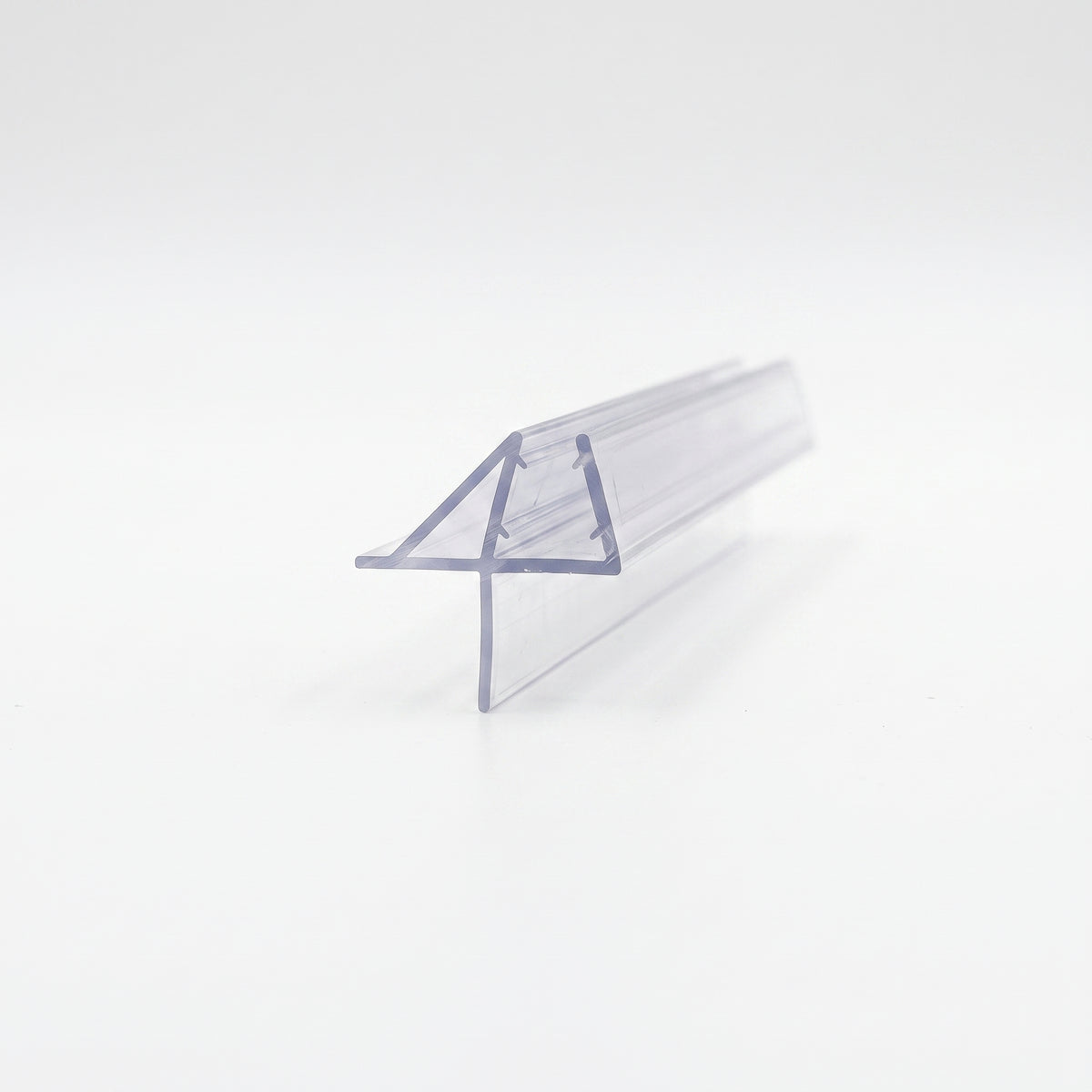 Clear seal offcut on white, glass channel with an angled deflector fin and a long drop blade