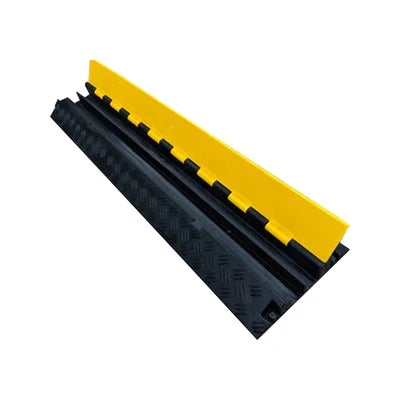 Two-channel cover with the yellow hinged lid propped open, black chequer-tread body alongside