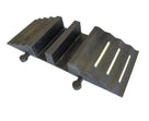 Angled view of the moulded rubber ramp, two open cable channels and lime green strips on the ribbed slopes