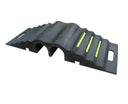 Angled view of the black rubber ramp showing two arched cable channels, yellow strips and carry handle slots