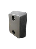 Grey-toned rubber dock bumper seen end-on at an angle, two empty recessed fixing holes, white background
