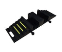 Full length of the ramp portion at an angle, ribbed tread with yellow strips leading to the interlocking end block