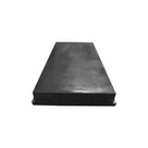 Low flat black rubber dock bumper block, front-angled view showing its shallow depth