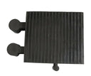 Overhead view of the ribbed black rubber block showing the two side pegs and a third peg on the front edge