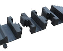 Close-up along the row of black centre blocks, showing the zig-zag interlocking teeth between sections