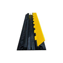 End-on view down the cover with the yellow lid raised, revealing the two cable channels inside