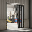 Black mesh strip curtain hung in a warehouse loading bay doorway, a forklift and driver working inside