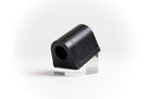 Black rubber anti-roll bar bush on a clear stand, angled studio view