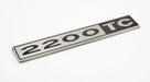Chrome-edged 2200TC badge on a plain white background