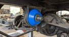 Blue differential mounting cone fitted to a classic car's rear axle