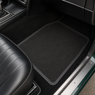 Ribbed floor mat fitted in a classic car footwell, in-situ shot