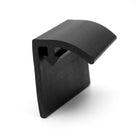 Black PVC door seal standing upright, curved flag over a hooked base