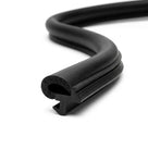 Black rubber battery box seal coiled, showing sponge bulb and gripper leg