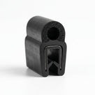 Short block of black self grip seal, upright, with round hollow sponge bulb and smooth U-shaped grip