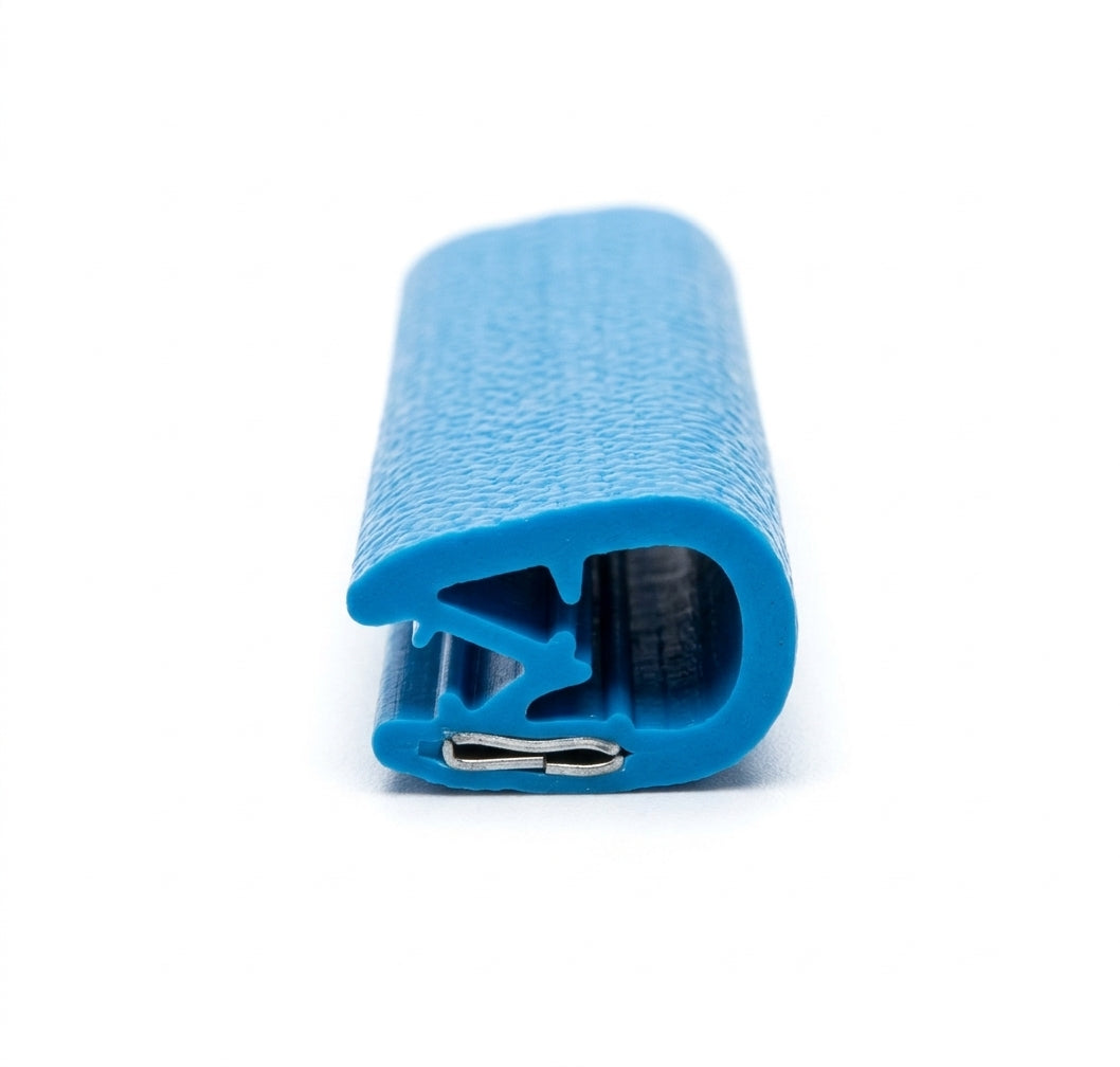 Cut length of blue textured PVC edging strip showing the metal grip clip at the open end